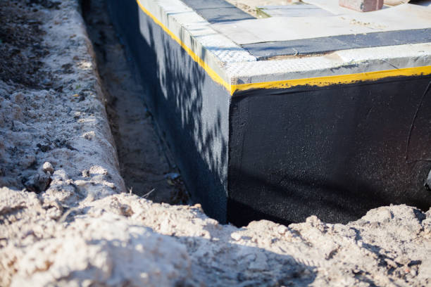 Professional Waterproofing technician working in Pendleton, KY
